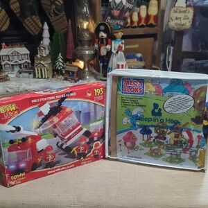 Best-Lock Fire Fighters set and a Mega Bloks Smurf-themed sets Lego